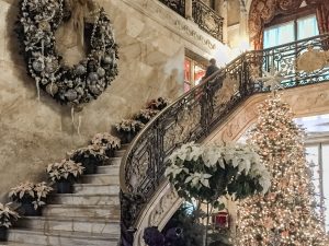 marble staircase decorated for christmas