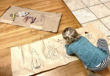 How to keep a toddler busy - toddler doodling on paper bag