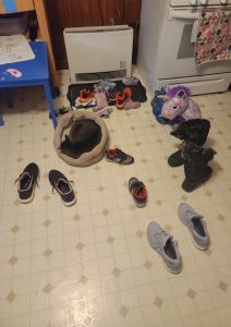shoes strewn all over the floor because my house is a mess